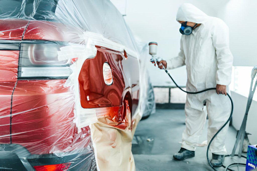 "A car insurance agent reviewing a claim for PDR coverage.